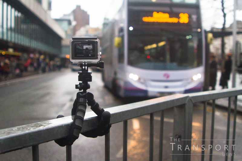 GoPro on railing to film buses
